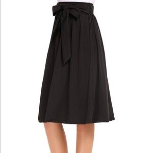 Long Black Pleated Skirt with Bow